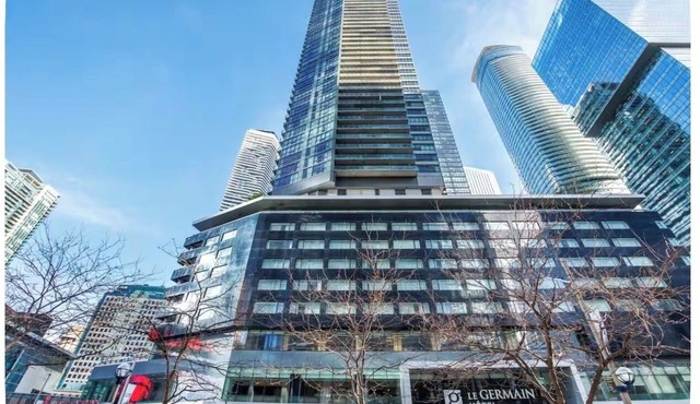 Bright condo on 39th floor with skyline views from large balcony