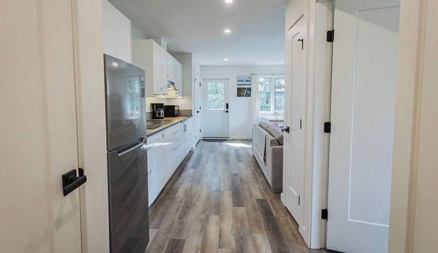Bright & spacious 1 bedroom suite by the beach!