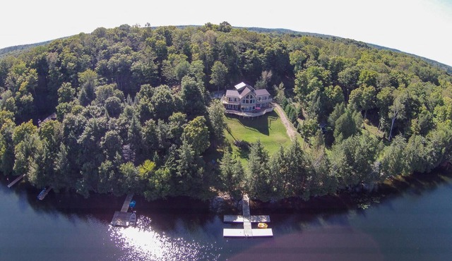 Calypso Cottage 4000sq. Foot of Lakefront Real Estate
