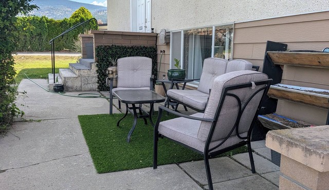 Central 2 bedroom suite, full kitchen, living room with private entrance.