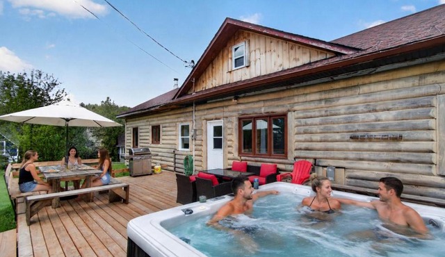 Chalet du lac avec SPA privé, wifi, BBQ et SUP