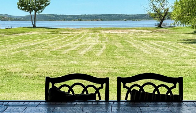 Charming waterfront retreat on PK with beach swimming area in Graford