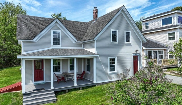 Coastal charm & harbor views just steps from Sand Cove Beach