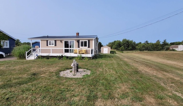 Coastal Charm in Caissie Cape Beach Community