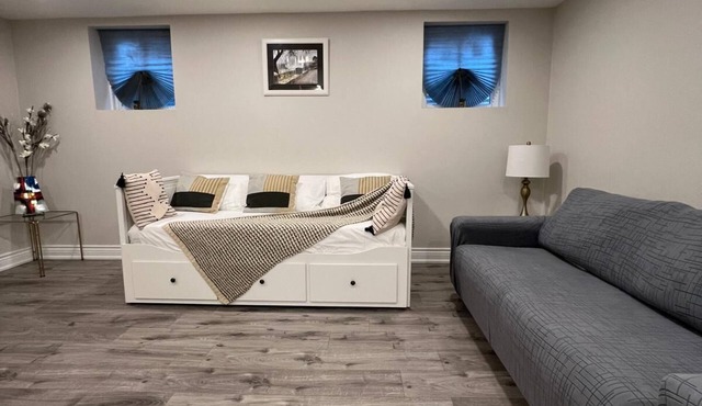 Comfy Basement Apartment with Private entrance and free car