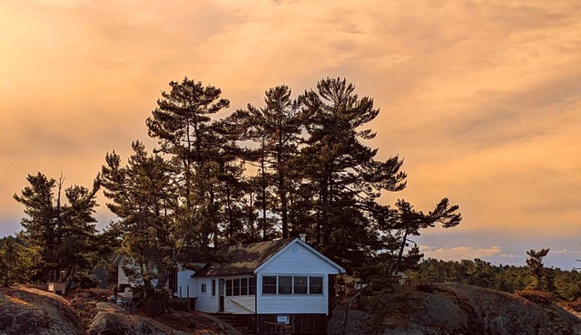 Cozy cabin on a private Island with amazing views & great fishing spot!