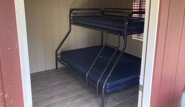 Cozy solar Bunkie cabin located happy green acres campground