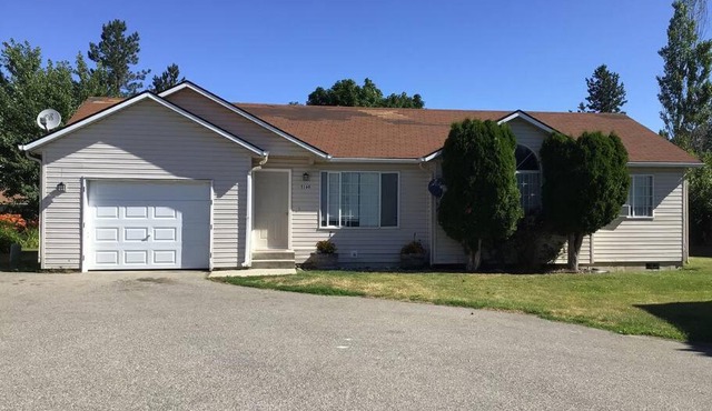 Cute CDA home w/garage & yard! in Atlas