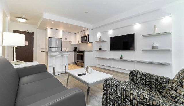 Discover an urban retreat in this spacious one-bedroom suite in Downtown Toronto