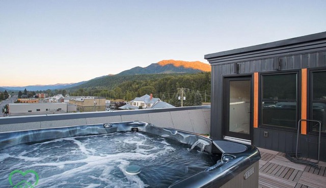 Downtown Loft with Rooftop Hot Tub by StayIn