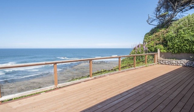 Dramatic oceanfront views. Open high ceilings. Huge deck & walls of windows! in Lincoln City