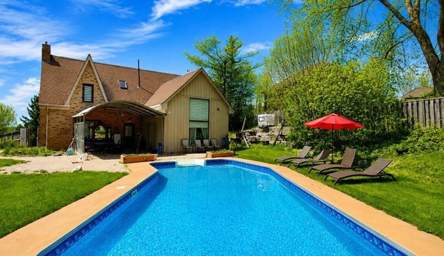 Enchanting Home with Pool and Sauna on 1 Acre Land