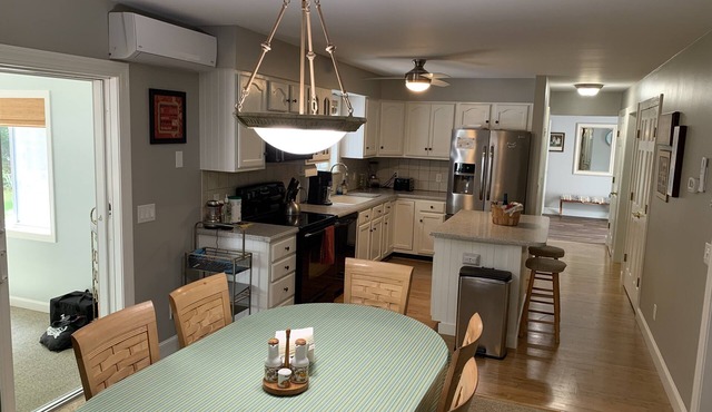 Enjoy the best of all seasons in this 4 bedroom home minutes from the water. in Moultonborough