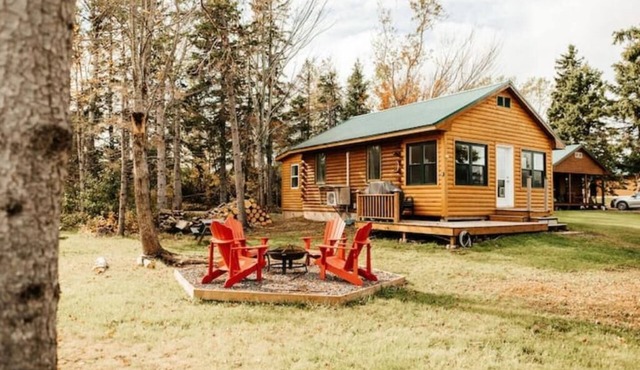 Escape to Tranquility at The Sandy Pearl: A Cozy Log Cottage Retreat