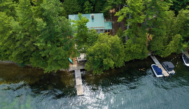 Exclusive Lakefront Cottage on Big Rideau Lake – Private Dock, Sauna, & Sunset