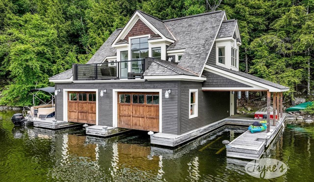 Exquisite 5 Bdrm 4 Bath Cottage with Boathouse and Professional Gym! SW Views!