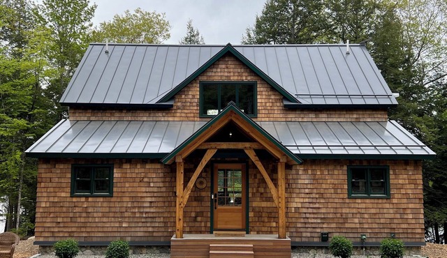 First-year deal! New 4-bedroom post and beam lake house on a semi-private pond.