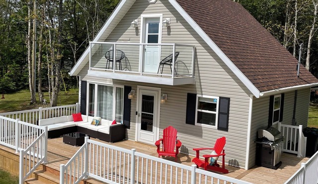 Forest Shore Cottage - peaceful and relaxing location, fire pit, view of water.