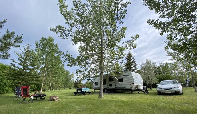 Fully equipped RV in park-like, treed, private setting!