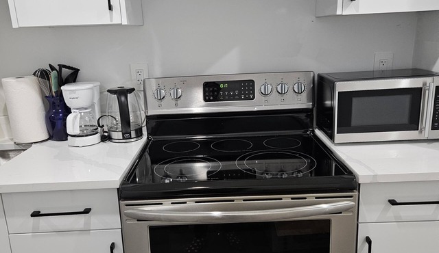 Fully furnished 1 bd cosy basement suite in the center of the city.