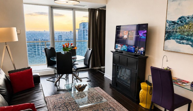 High-Floor 2BR Suite Balcony & Skyline Views | Walk to SickKids, UHN, TMU, Eaton