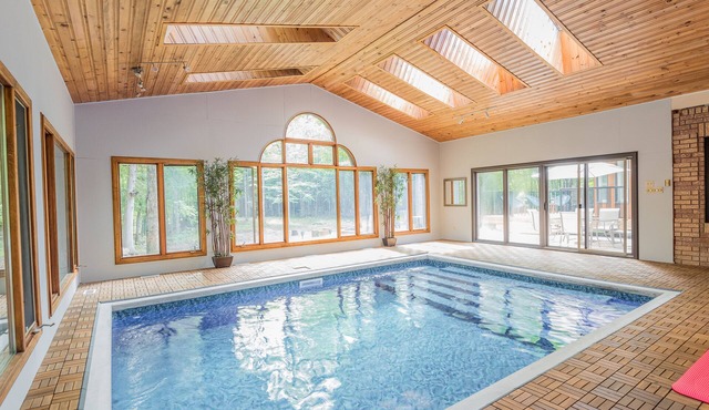 Indoor heated pool, Games room, Yoga, Privacy, Fire Pit, 7 bedrooms, Starlink