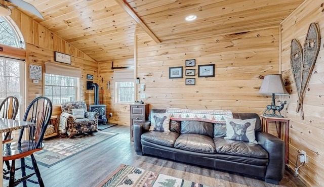 Lake-view two-story home with beach access, wood stove, grill, W/D, & fast WiFi