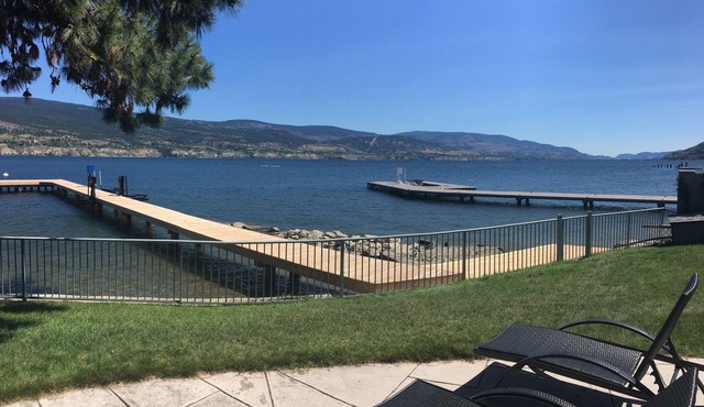Lakefront family oriented property -- flat, fully fenced 177 ft. beach front