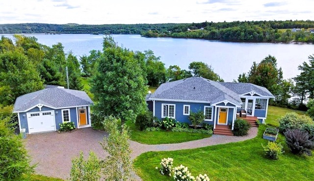 Lakefront Home on Washademoak Lake with Dock and 255 ft of Water Frontage.