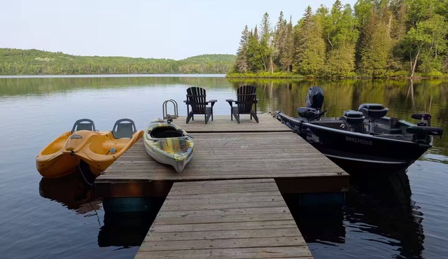 Lakefront log cabin with private dock