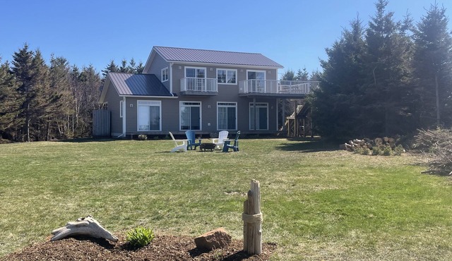 Large beach house with cottage feel, with ocean views and steps from sandy beach in Darnley