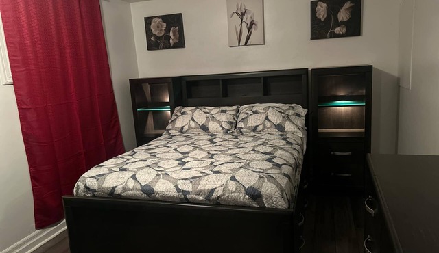 Luxurious Bedroom with Queen Bed & Full Bath.