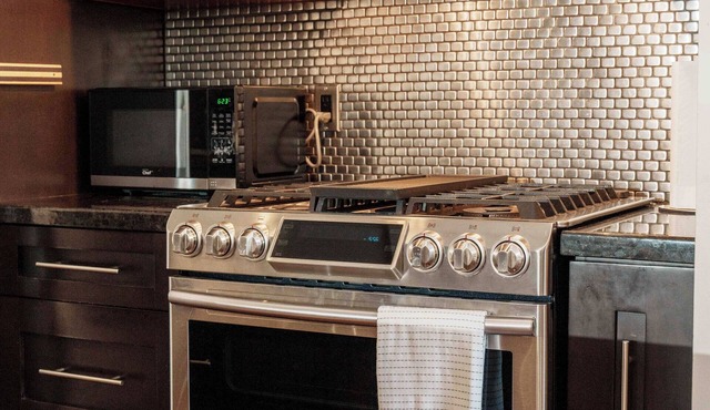 Luxury Haven Near DT | AC, Hot Tub, EV Charging