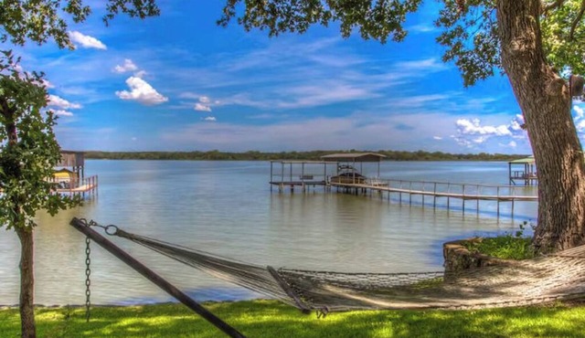 Luxury Lakefront Home on Eagle Mountain Lake, Sleeps 14, Hot Tub, Private Dock in Azle
