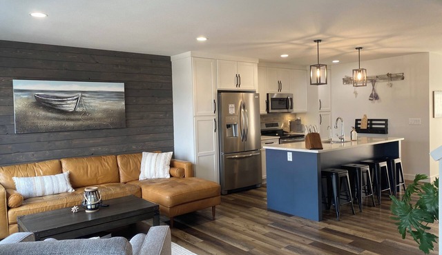 Luxury Lakeview Townhome in Sylvan Lake with a private backyard oasis.