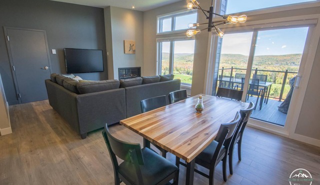 Luxury mountain condo with golf and slide views