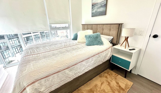 Modern 2BR City Oasis with Two Balconies, Nature Walks, & Family Comfort