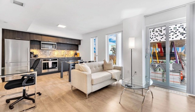 Modern 2BR Downtown Toronto Condo | Near Queen St & Univ Ave | Work-Friendly
