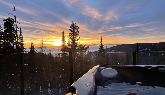Modern home with private hot tub, sauna, heated floors and private suite.