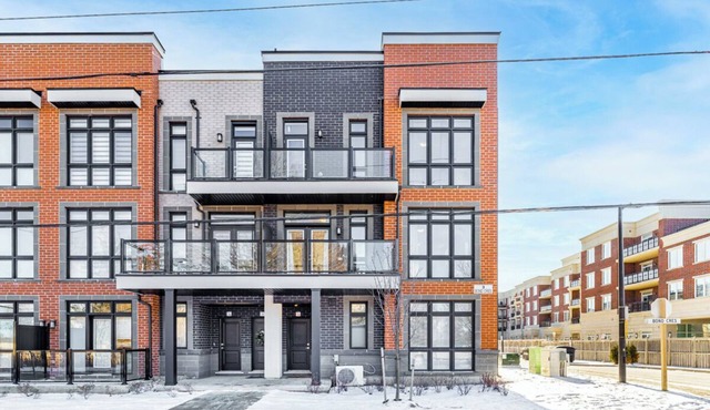Modern open-concept, 2-bedroom townhouse with plenty of natural light.