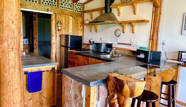 Natural Home Built in Earthship Style on Waterfront Property