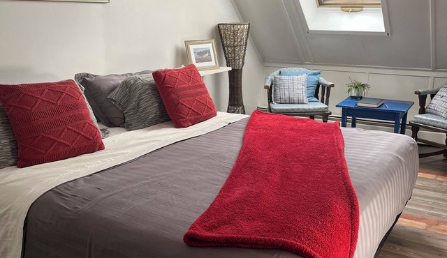 New Cozy, a one-bedroom apartment with its own entrance, and loft bedroom.