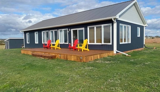 Newly built with "the best view on the island". Handy access to the beach.