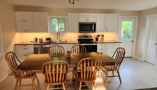 Newly renovated and furnished 4 bedroom home with office in the center of town