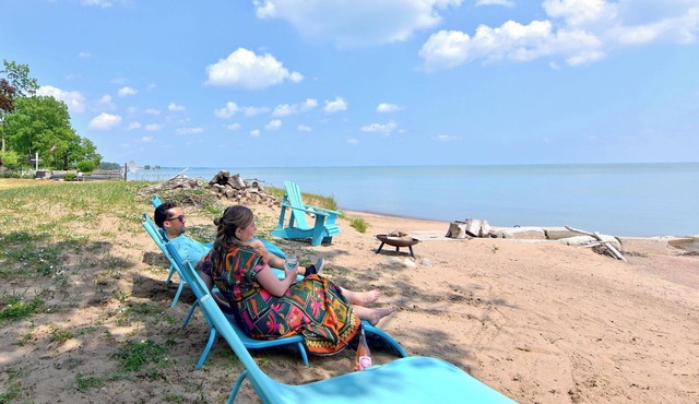 Prepare to fall in love with this adorably tropical beach front property!