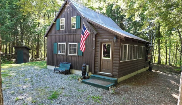 Quaint 1 Bedroom + Loft/1 Bath streamside Timber Frame cabin near Lincoln, ME.