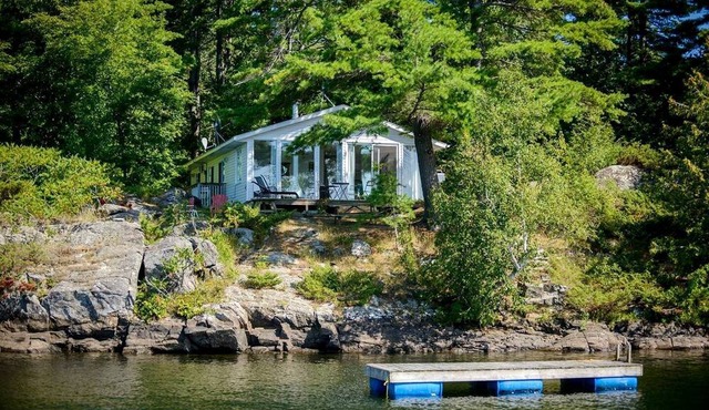 Spacious Lakefront Cottage Rental for Group Getaway on a Resort near Kingston, Ontario in Godfrey