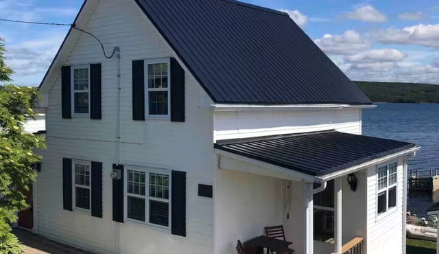 Squeeze More Inn on the ocean Traditional century old Newfoundland home