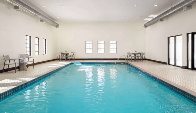 Stay Comfortably in a Pet-Friendly Suite with Swimming Pool Near Attractions