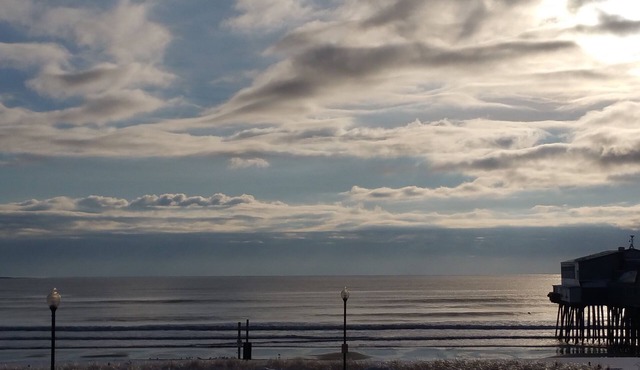 Steps away from the Sand, Sun and Fun In This Beachfront 2 Br Condo